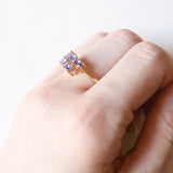 Anello moderno in oro giallo 9K con tanzaniti (1ctw ca.)