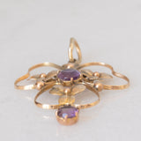 Pendente antico lavalier in oro giallo 9K con ametiste (0.60ctw ca.) e con decorazioni a foglie, anni ‘10/‘20