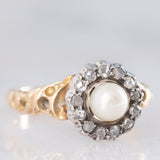 Anello a margherita antico in oro giallo 14K e argento con perla bianca e diamanti di taglio rosetta (0.13ctw ca.), primi del ‘900