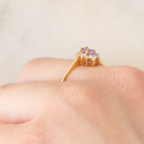 Anello a margherita in oro giallo 9K con zaffiro viola sintetico (0.25ct) e zirconi bianchi