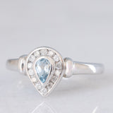 Anello vintage in oro bianco 9K con acquamarina (0.20ct ca.) e diamanti di taglio brillante (0.14ctw ca.), anni ‘90