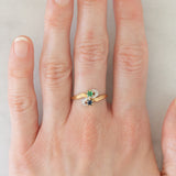 Toi et Moi vintage in oro giallo 18K con zaffiro (0.09ct ca.), smeraldo (0.06ct ca.) e diamanti, anni ‘70/‘80