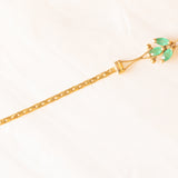 Braccialetto semirigido in oro giallo 14K con smeraldi (0.50ctw ca.) e diamanti (0.02ctw ca.), anni ‘70/‘80