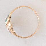Anello contrarier antico a doppio serpente in oro giallo 14K con smeraldi, rubini e diamanti di taglio vecchio (0.16ctw ca.), anni ‘20