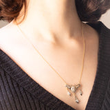 Collier Art Déco in oro giallo e bianco 18K con diamanti di taglio brillante e di taglio vecchia miniera (0.45ctw ca.), anni ‘20/‘30