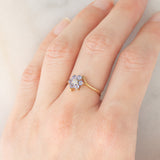 Anello contrarier con fiore in oro giallo 9K con tanzaniti (0.36ctw ca.) e diamante, anni ‘90