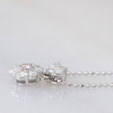 Cogli questa rosa - Collana vintage in platino con diamante rosa e diamanti bianchi