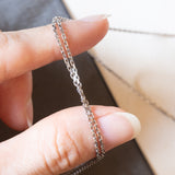 Collier Art Nouveau in oro bianco 18K con perline bianche e diamanti, anni ‘20