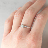 Solitario Art Déco in oro bianco 18K con diamante di taglio brillante (0.15ct ca.), anni ‘30