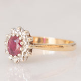 Anello a margherita vintage in oro giallo 9K con rubino (0.35ct ca.) e diamanti (0.06ctw ca.), anno 1984