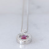 Collana vintage in platino con ciondolo con rubino (0.21ct) e diamanti di taglio brillante (0.24ctw)