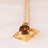 Collana vintage con catenina in oro giallo 9K e con ciondolo in oro giallo 9K con quarzo citrino (0.40ct ca.), anno 1978