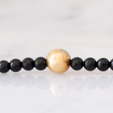 Collana moderna con onice e oro giallo 18K