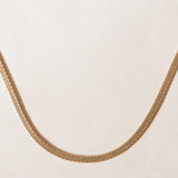 Collana vintage in oro giallo 8K con maglia omega