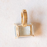 Ciondolo vintage in oro giallo e bianco 14K con topazio azzurro (2ct ca.) e diamanti (0.03ctw ca.), anni ‘70