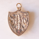 Ciondolo portafoto vintage a forma di scudo con lamina in oro giallo 9K su metallo