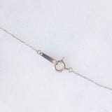 Collana vintage in oro bianco 10K con punto luce con spinello azzurro e diamante, anni ‘90/anni ‘2000