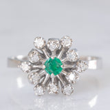 Anello a fiocco di neve in oro bianco 14K con smeraldo (0.13ct ca.) e diamanti (0.24ctw ca.), anni ‘70