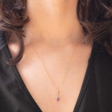 Collana vintage con catenina in oro giallo 9K e con ciondolo in oro giallo e bianco 9K con ametista (0.35ct ca.) e diamanti, anni ‘70
