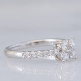 Anello a fiore vintage in platino con diamanti di taglio brillante (0.45ctw), anni ‘90