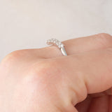 Anello a “V” in platino con diamanti di taglio brillante (0.50ctw), anni ‘80