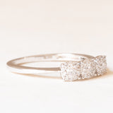 Anello “trilogy” in oro bianco 18K con diamanti (0.42ctw ca.), anni ‘80