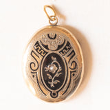 Ciondolo portafoto antico in oro giallo 18K con smalti neri e perlina bianca, primi del ‘900