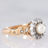 Anello a margherita antico in oro giallo 14K e argento con perla bianca e diamanti di taglio rosetta (0.13ctw ca.), primi del ‘900