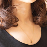 Collana vintage con catenina in oro giallo 9K e con ciondolo in oro giallo 9K con quarzo citrino (0.40ct ca.), anno 1978