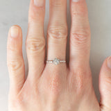 Solitario Art Déco in oro bianco 18K con diamante di taglio brillante (0.15ct ca.), anni ‘30