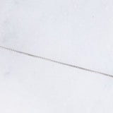 Collana punto luce vintage in platino con diamante di 0.15ct, anni ‘90/anni ‘2000