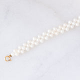 Collana vintage di perle bianche con chiusura in oro giallo 18K, anni ‘60/‘70