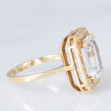 Anello a margherita vintage in oro giallo 14K con acquamarina (3.30ct ca.) e diamanti (0.22ctw ca.), anni ‘70