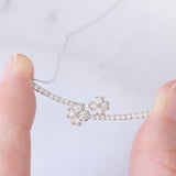 Collier vintage in platino con decorazione con quadrifogli con diamanti (0.43ctw)
