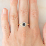 Anello a margherita vintage in oro giallo 9K con zaffiro (0.70ct ca.) e diamanti (0.08ctw ca.), anno 1991