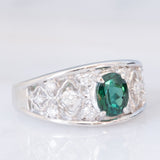 Anello a fascia in platino con tormalina verde (1.13ct) e diamanti (0.38ctw) e con lavorazioni a traforo, anni '90/anni '2000
