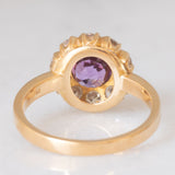 Anello a margherita vintage in oro giallo 18K con zaffiro rosa (1.70ct ca.) e diamanti di taglio brillante (1ctw ca.), anni ‘60/‘70