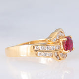 Anello a margherita vintage in oro giallo 18K con rubino (0.51ct) e diamanti (0.41ctw), anni ‘80/‘90