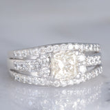 Anello a fascia vintage in platino con diamanti per un totale di 1.25ct (centrale di taglio princess 0.78ct), anni ‘80