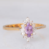 Anello a margherita in oro giallo 9K con zaffiro viola sintetico (0.25ct) e zirconi bianchi
