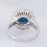 Anello a margherita vintage in platino con zaffiro (4.30ct) e diamanti (1.05ctw), anni ‘80