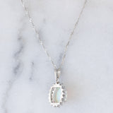 Collana vintage in platino con ciondolo con opale (1.78ct) e diamanti (0.56ctw)