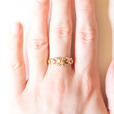Anello vintage con infinito e cuori in oro giallo 14K