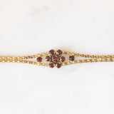 Braccialetto vintage in oro giallo 8K con granati (0.90ctw ca.), anni ‘50