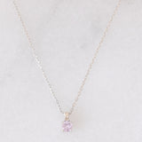 Collana vintage in oro bianco 10K con ciondolo punto luce con zaffiro rosa e diamante