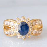 Un’alba sul mare - Anello vintage a fascia e a margherita in oro giallo 18K con zaffiro e diamanti