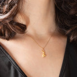 Ciondolo vintage a forma di coniglietto in oro giallo 18K