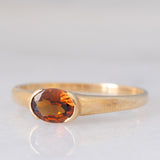 Solitario vintage in oro giallo 9K con granato (0.62ct ca.), anni ‘60/‘70