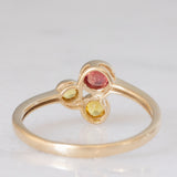 Trilogy astrattato in oro giallo 8K con topazi colorati (0.30ctw ca.), anni ‘70/‘80