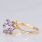 Anello contrarier con fiore in oro giallo 9K con tanzaniti (0.36ctw ca.) e diamante, anni ‘90